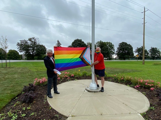 Warden Marks raises Pride Flag